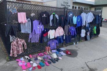 Lost and found clothing located at front of school